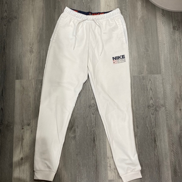 Nike sweatpants, white with blue and red logo and waistband, standard size small - Picture 2 of 3